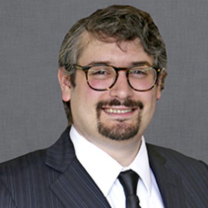 Headshot of Principal Consultant Joshua G.