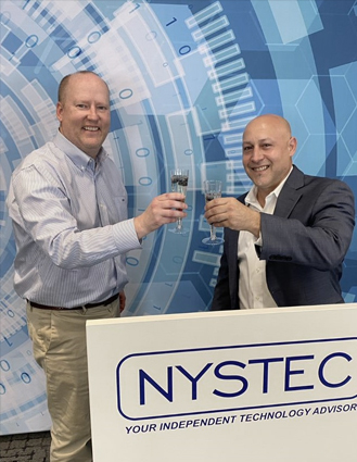 NYSTEC President and CEO Kevin Owens toasting with Business Development Director Mark Romano in front of blue tech background.