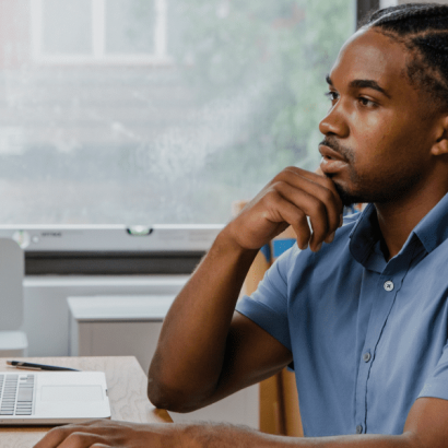 Senior Consultant - Database Designer image: a person is reading information on a monitor.